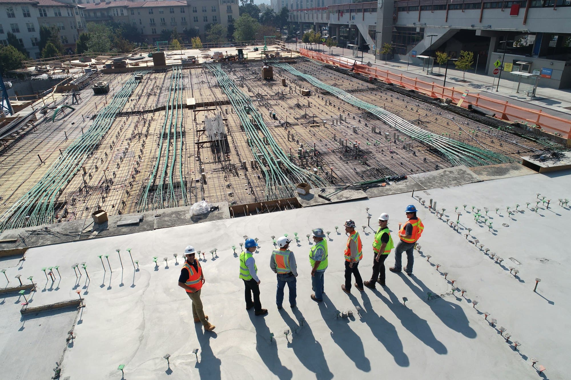 Construction professionals reviewing project plans