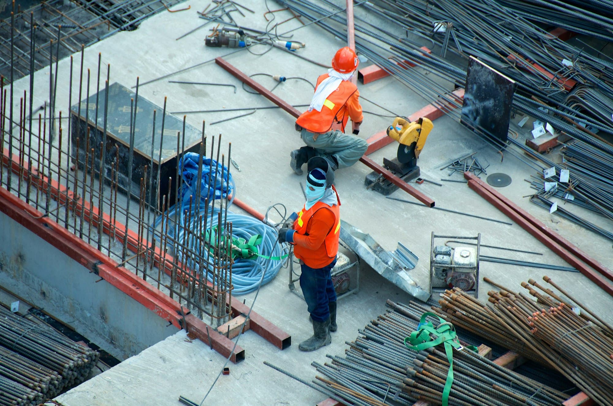 Active construction site with crane and steel work